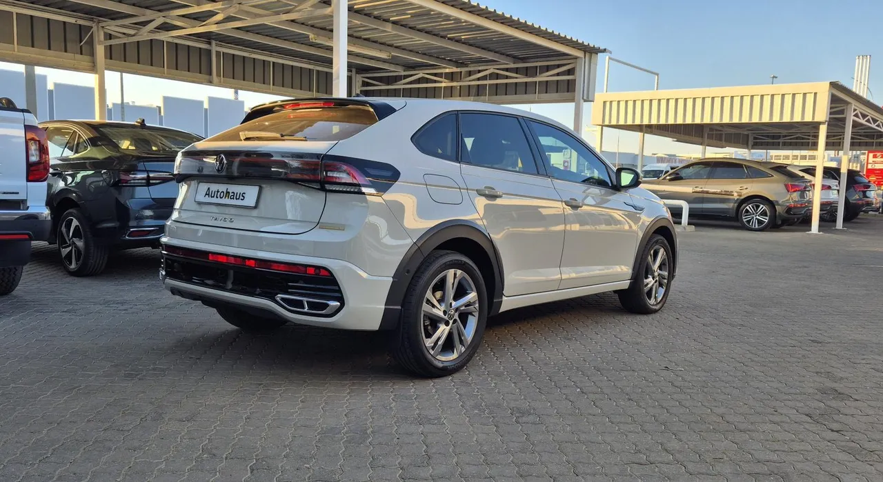 TAIGO 1.0 TSI R-LINE DSG — photo 4
