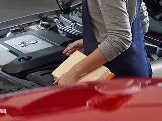An Autohaus Namibia technician servicing a Volkswagen air-conditioning system